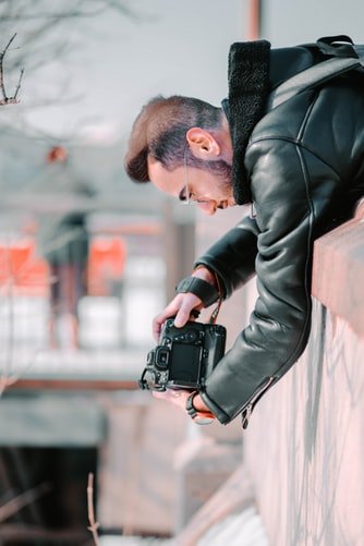person photographing from above