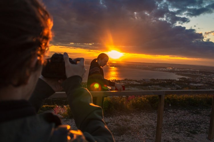 person shooting into the light