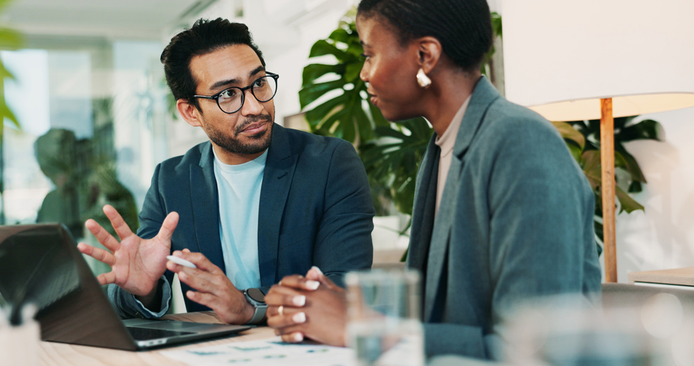 Office, training and team advice for laptop, proposal and research notes with document for report. Man, woman and feedback for small business, collaboration and meeting for partnership or b2b project