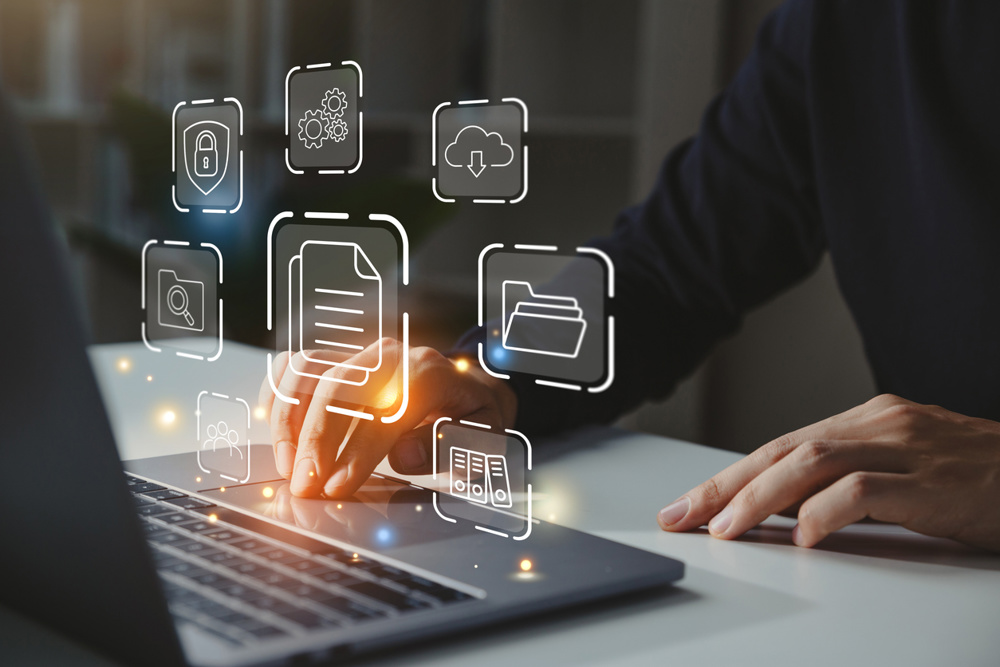 Businessman working on laptop with document management icon, Online document file management, database technology concept