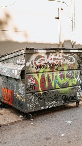 Graffiti on a trash bin