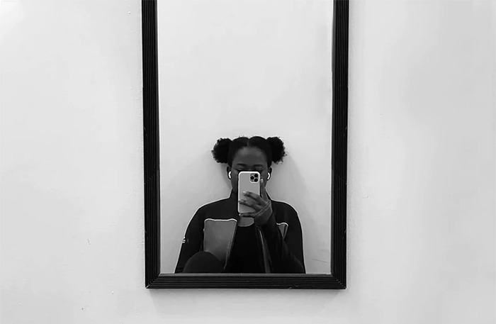 Girl taking a mirror selfie